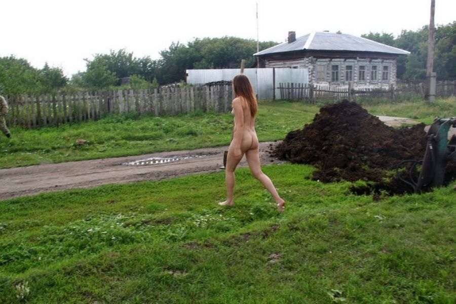 Free porn pics of cute russian female slave working outside 16 of 31 pics