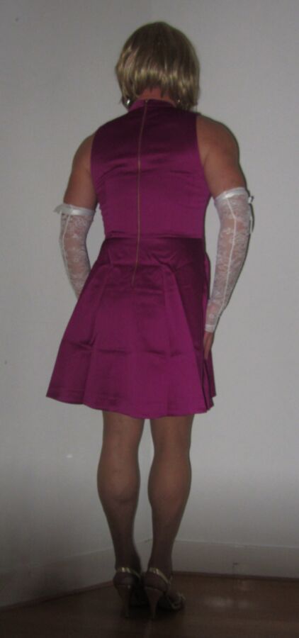 Free porn pics of Me Cindy Cross crossdressing in a cerise purple dress 3 of 3 pics