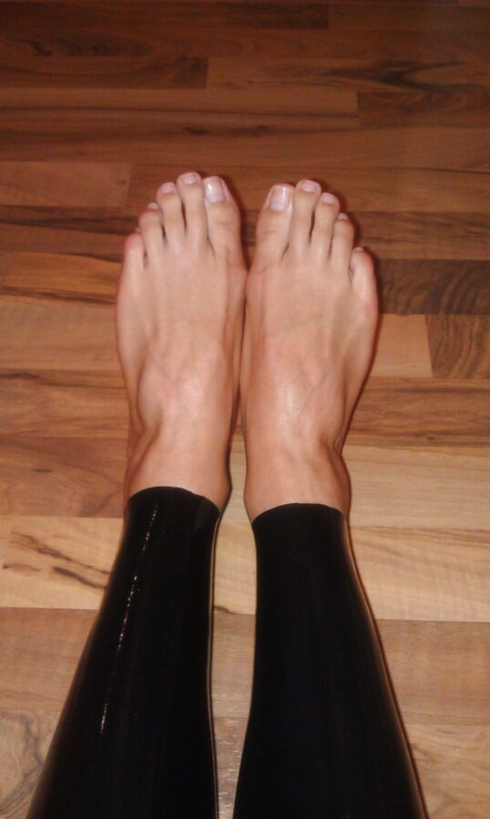 Free porn pics of Slavegirl Nicole - Teen Feet in Latex Leggings and standing on T 9 of 9 pics