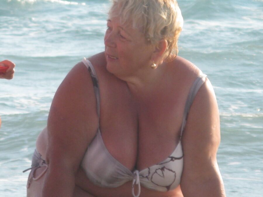 Free porn pics of Lovely Granny on a beach 1 of 14 pics