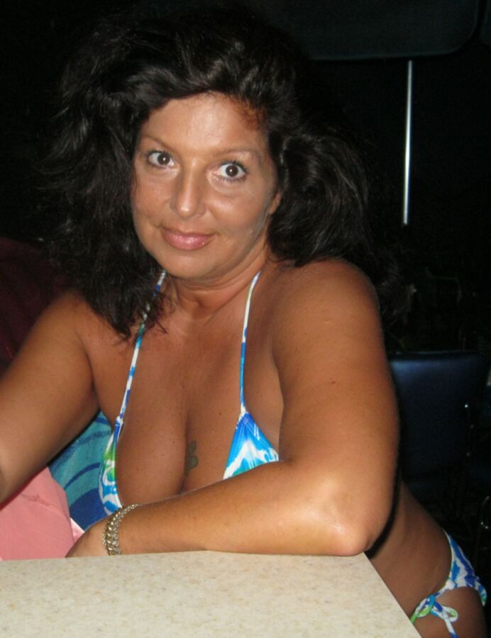 Free porn pics of Chubby milf shows off new bikinis on patio bar. 16 of 143 pics