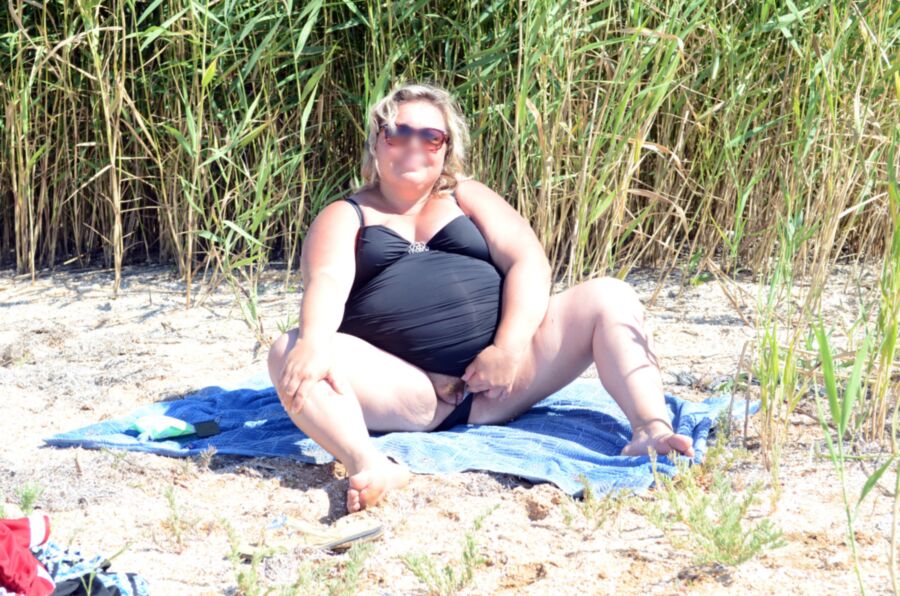 Free porn pics of my wife was sunbathing on the sea 22 of 37 pics