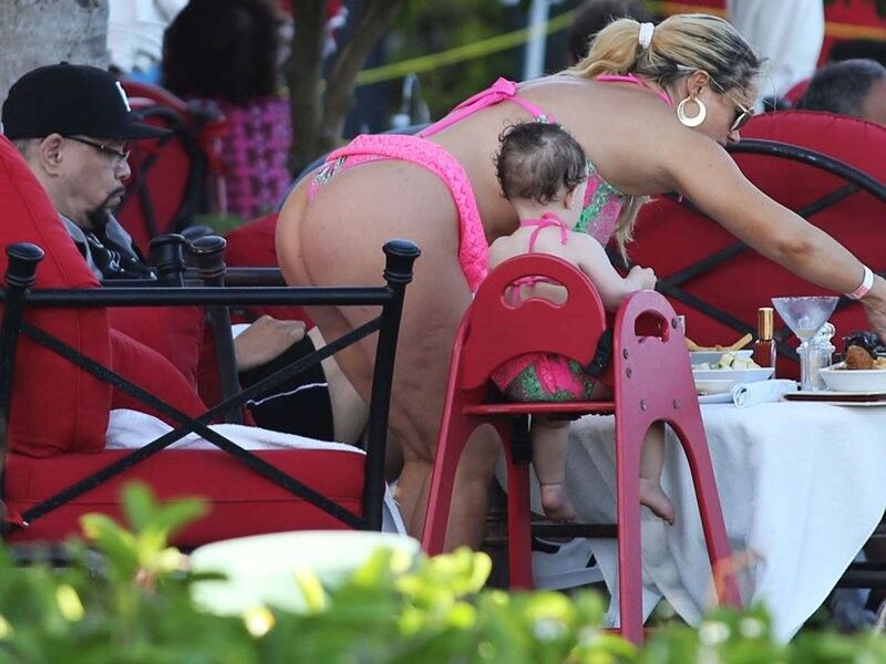 Free porn pics of Nicole Coco Austin in Pink Swimsuit in Miami 9 of 10 pics