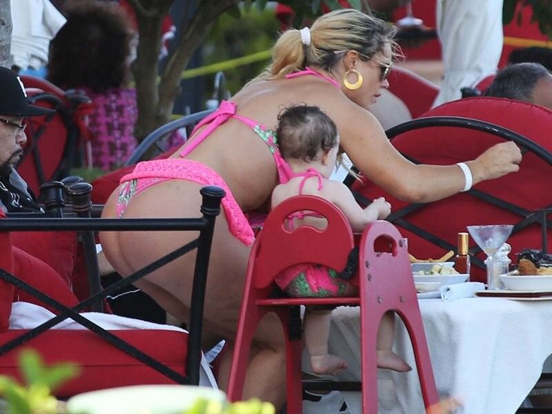Free porn pics of Nicole Coco Austin in Pink Swimsuit in Miami 5 of 10 pics