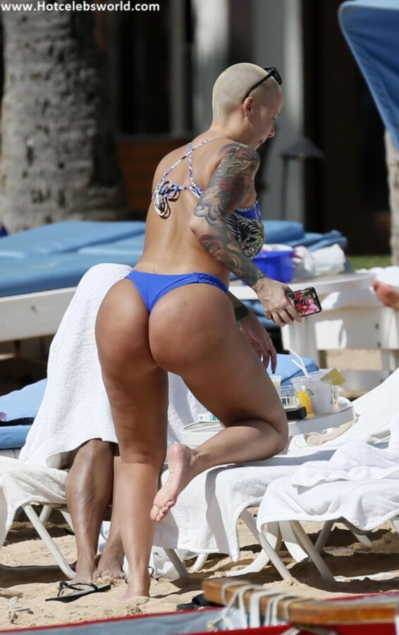 Free porn pics of Amber Rose in Bikini at the beach in Honolulu 16 of 16 pics