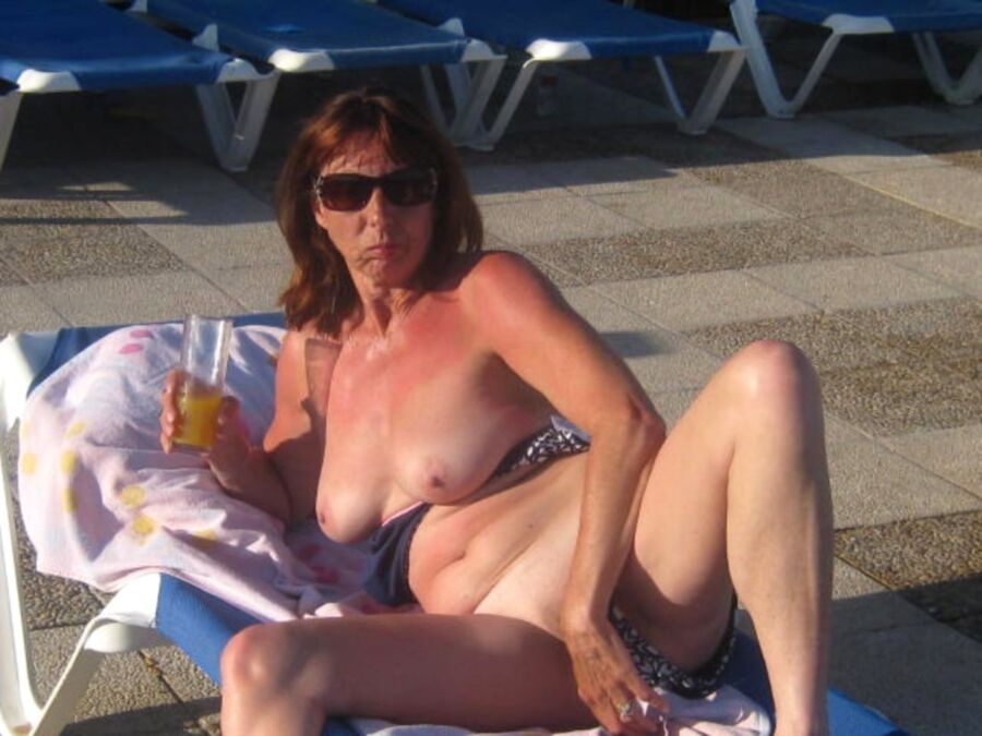 Free porn pics of candid milf on vacation 13 of 14 pics
