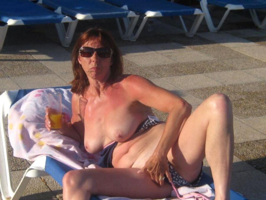 Free porn pics of candid milf on vacation 14 of 14 pics