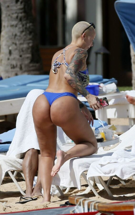 Free porn pics of Amber Rose thick ass again at the beach 5 of 10 pics