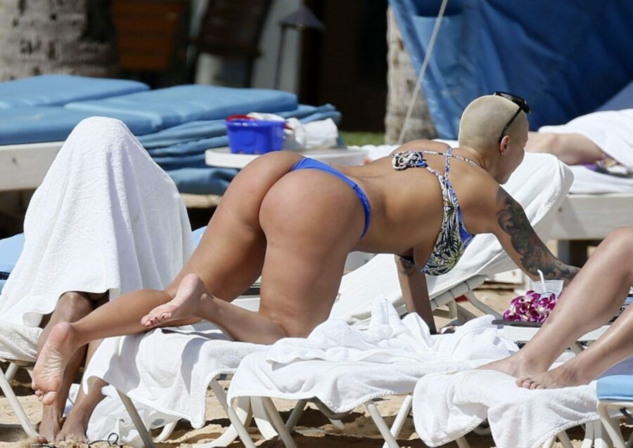 Free porn pics of Amber Rose thick ass again at the beach 6 of 10 pics