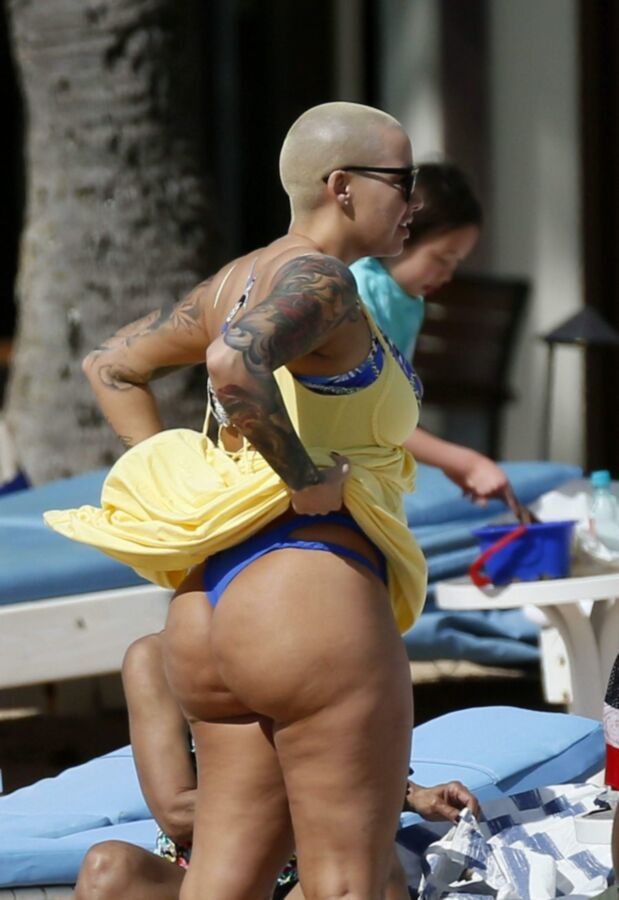 Free porn pics of Amber Rose thick ass again at the beach 4 of 10 pics