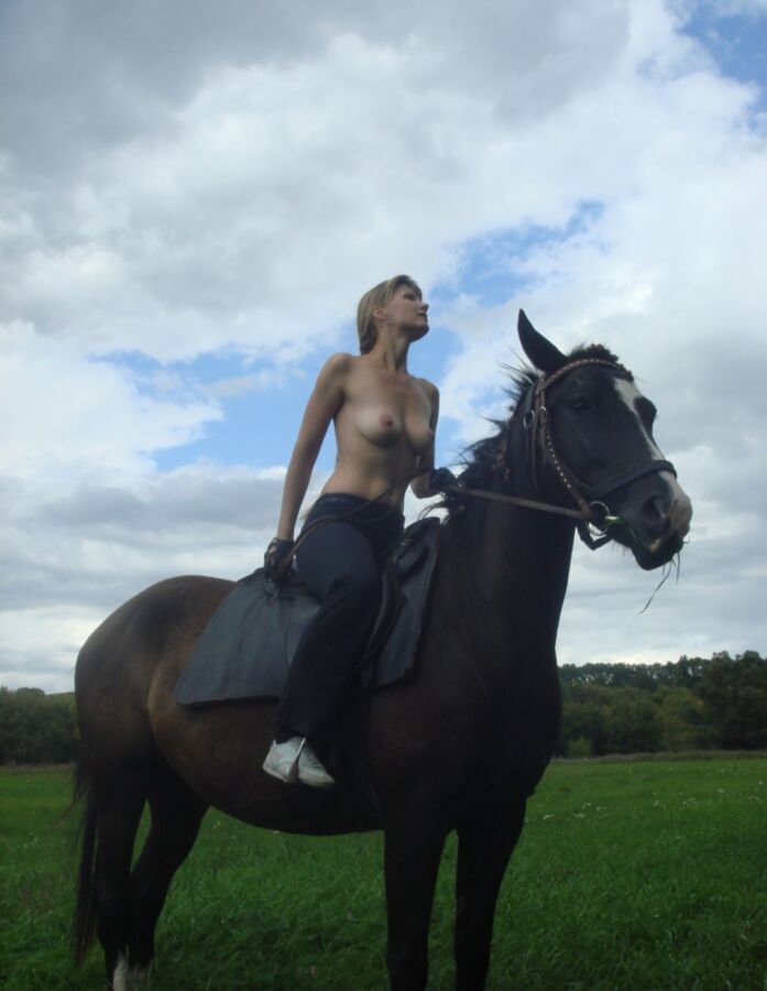 Free porn pics of Teen nude horse-riding 10 of 49 pics