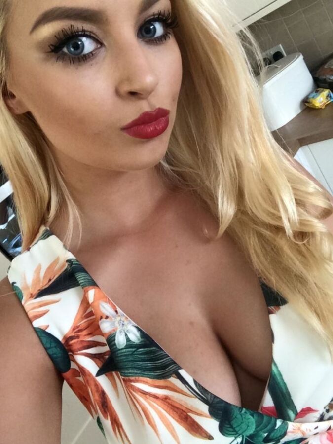 Free porn pics of Sexy Blonde from Devon loves to show off her cleavage 6 of 61 pics