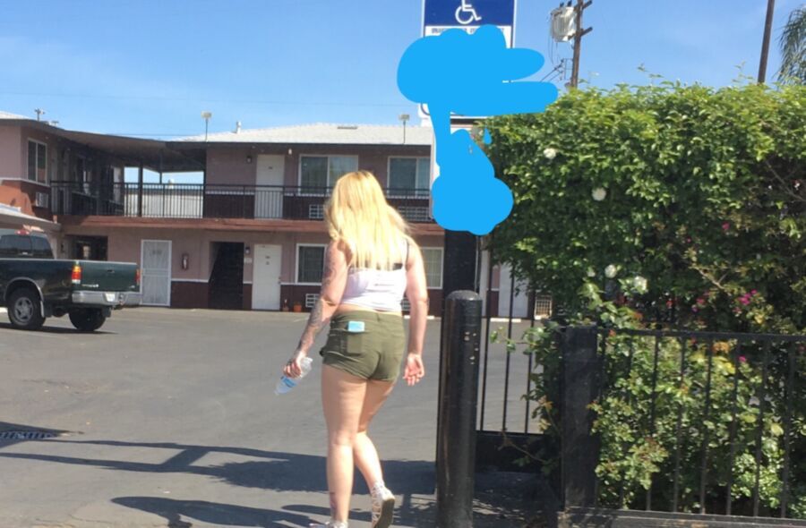 Free porn pics of White trash whore street walking 9 of 16 pics