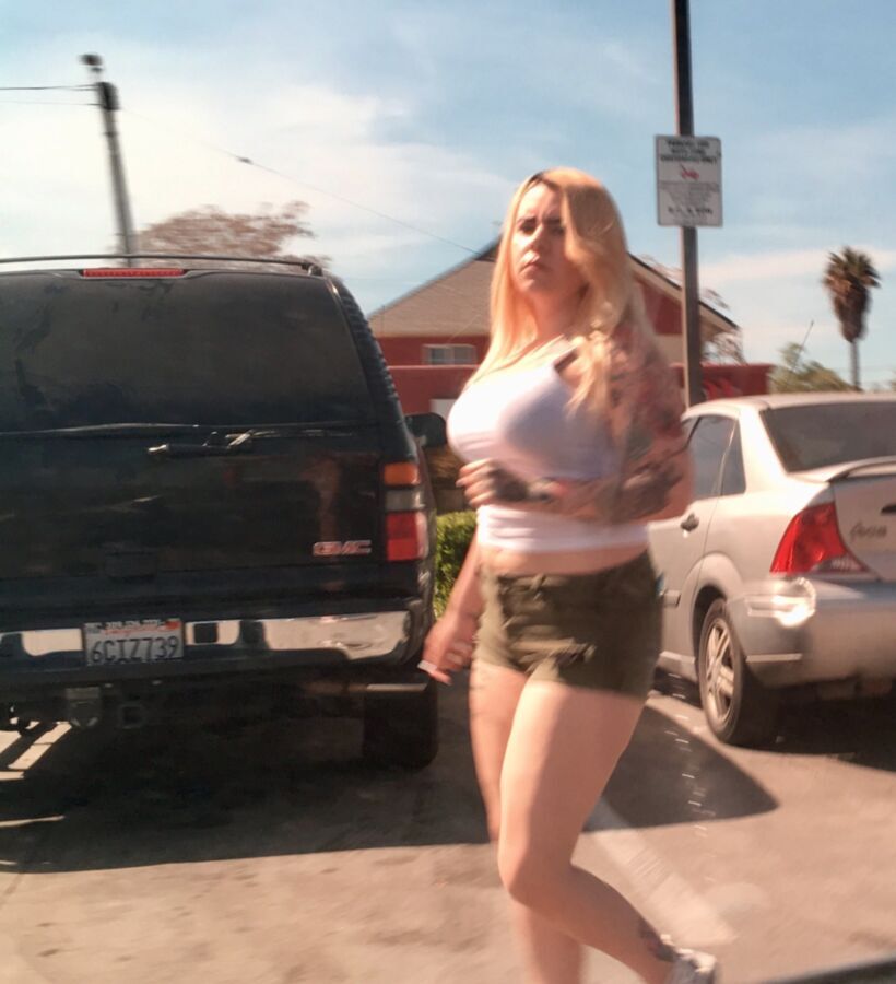 Free porn pics of White trash whore street walking 1 of 16 pics