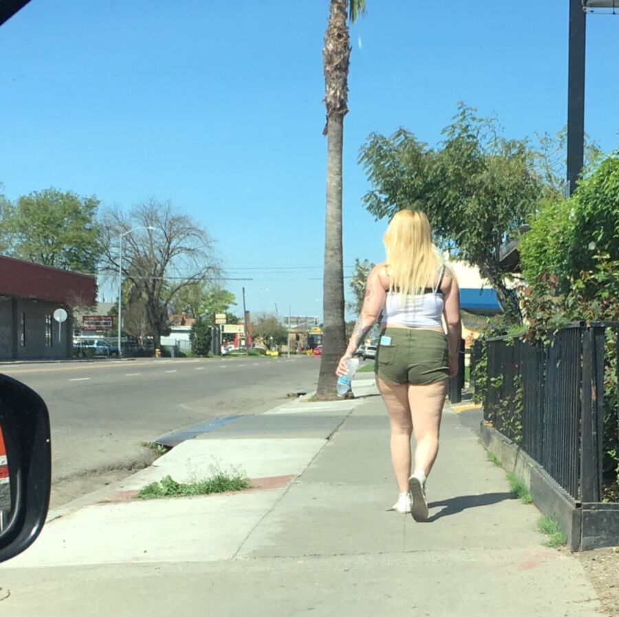 Free porn pics of White trash whore street walking 10 of 16 pics