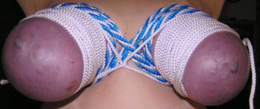 Free porn pics of Titties tied real tight two. 12 of 60 pics