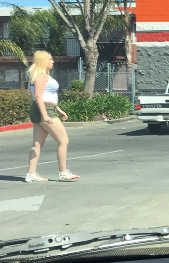 Free porn pics of White trash whore street walking 8 of 16 pics