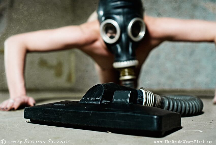 Free porn pics of Short-haired gas mask model 3 of 32 pics