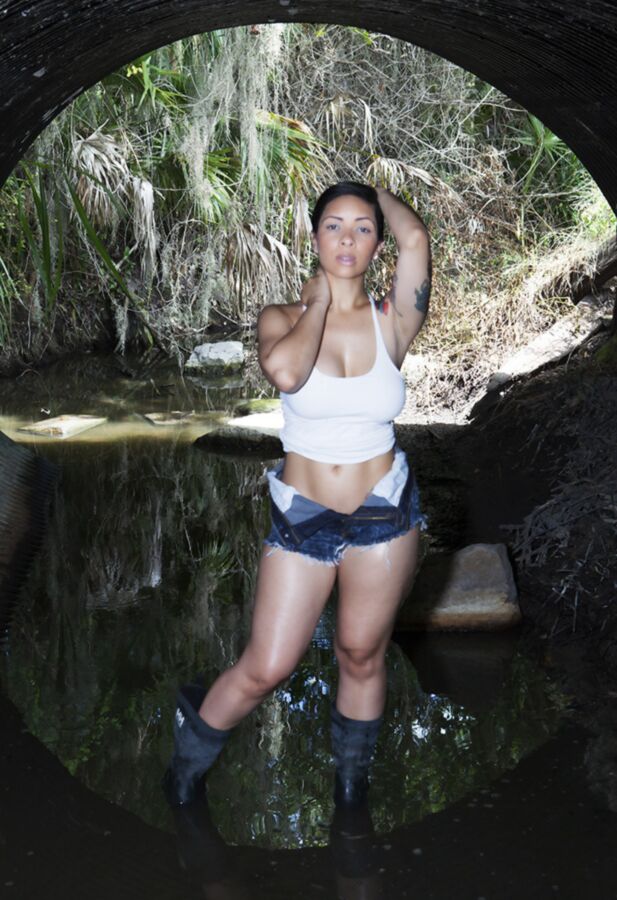 Free porn pics of Short-haired beauty in shorts and boots 11 of 21 pics