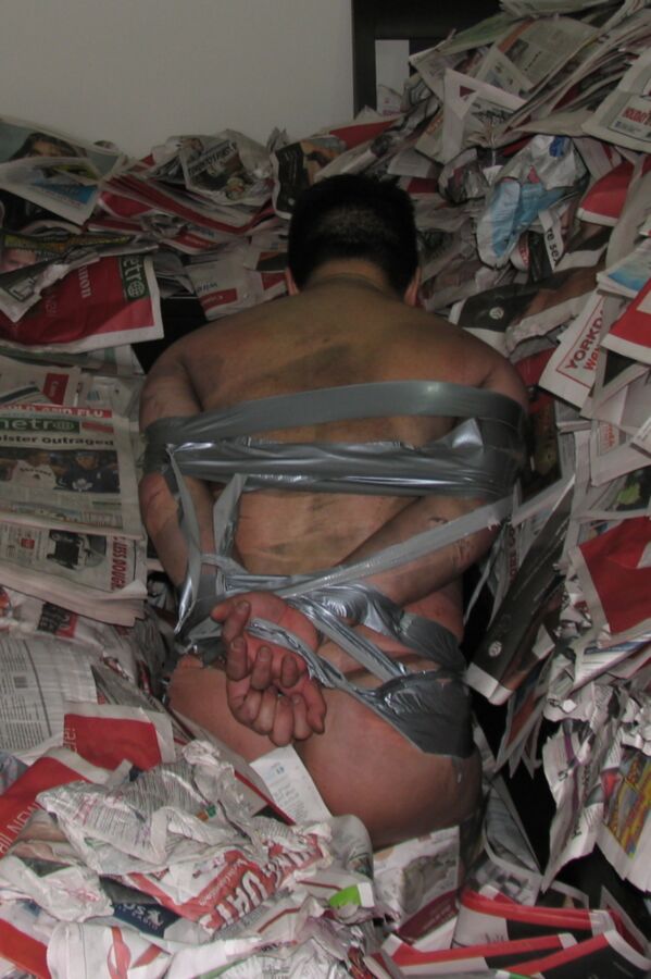 Free porn pics of Duct Tape Bound in Newspaper Pit 8 of 17 pics