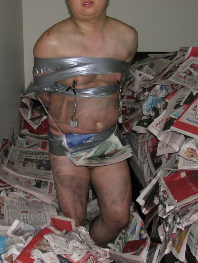 Free porn pics of Duct Tape Bound in Newspaper Pit 1 of 17 pics