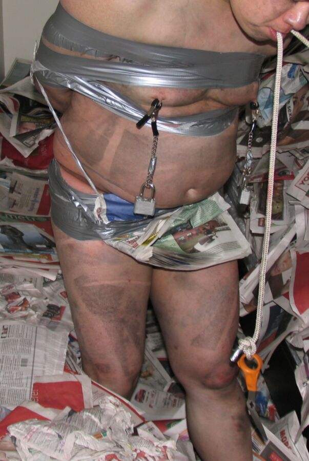 Free porn pics of Duct Tape Bound in Newspaper Pit 10 of 17 pics