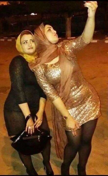 Free porn pics of hijab muslim women tight dresses 5 of 47 pics