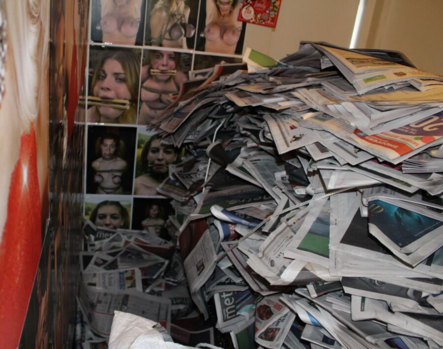 Free porn pics of Buried Under A LOT of Newspaper 5 of 12 pics