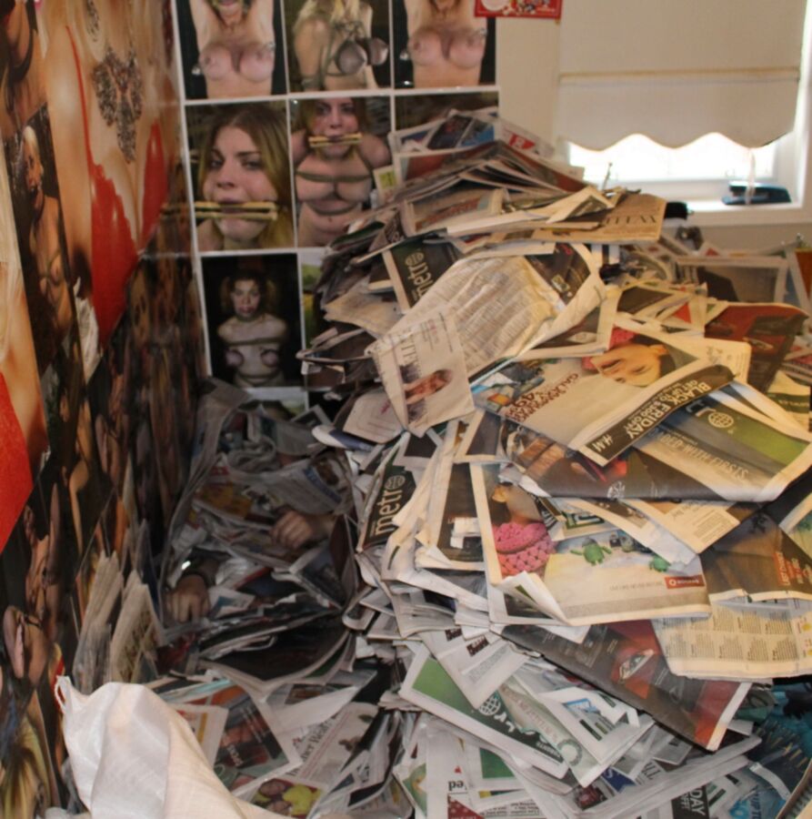 Free porn pics of Buried Under A LOT of Newspaper 9 of 12 pics