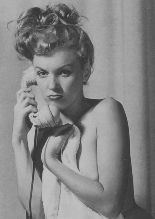 Free porn pics of Marilyn Monroe Posing Nude on the Phone Pics 4 of 22 pics