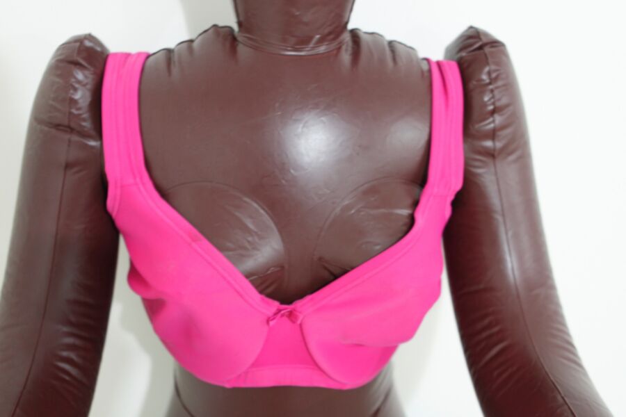 Free porn pics of Black inflatable doll in pink lingerie. 19 of 24 pics