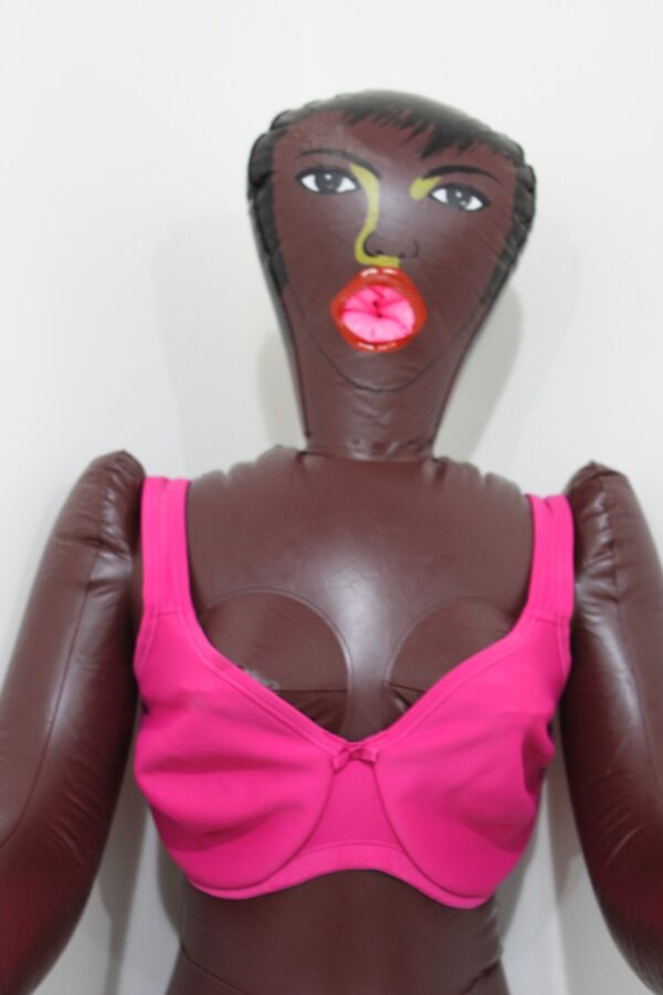 Free porn pics of Black inflatable doll in pink lingerie. 6 of 24 pics