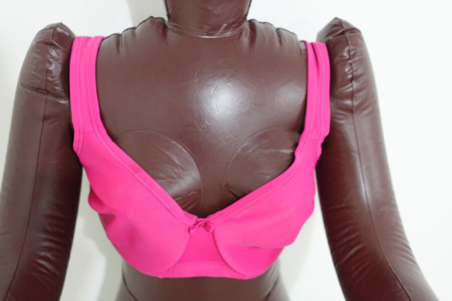 Free porn pics of Black inflatable doll in pink lingerie. 20 of 24 pics