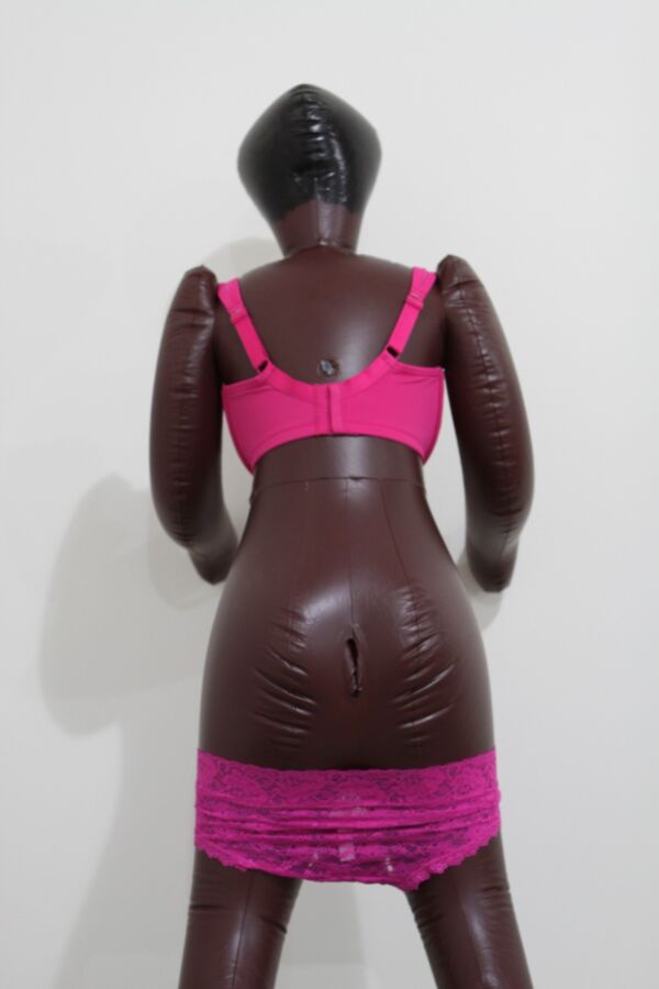 Free porn pics of Black inflatable doll in pink lingerie. 18 of 24 pics