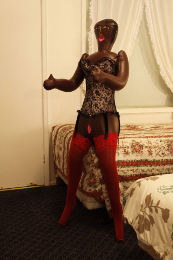 Free porn pics of Black doll wears corset and red pantyhose 1 of 59 pics
