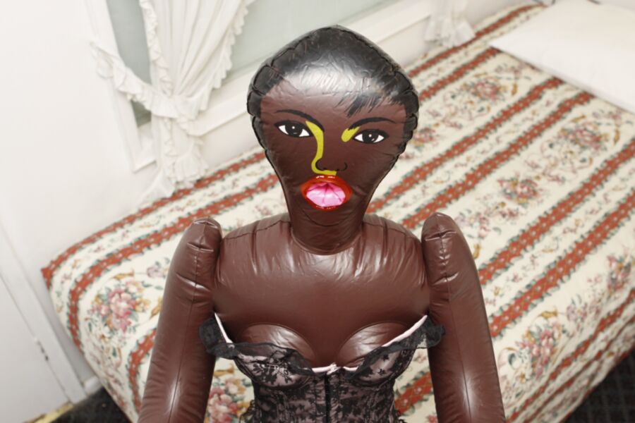 Free porn pics of Black doll wears corset and red pantyhose 15 of 59 pics