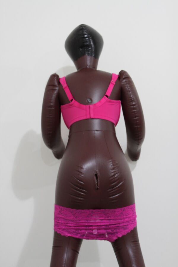 Free porn pics of Black inflatable doll in pink lingerie. 16 of 24 pics