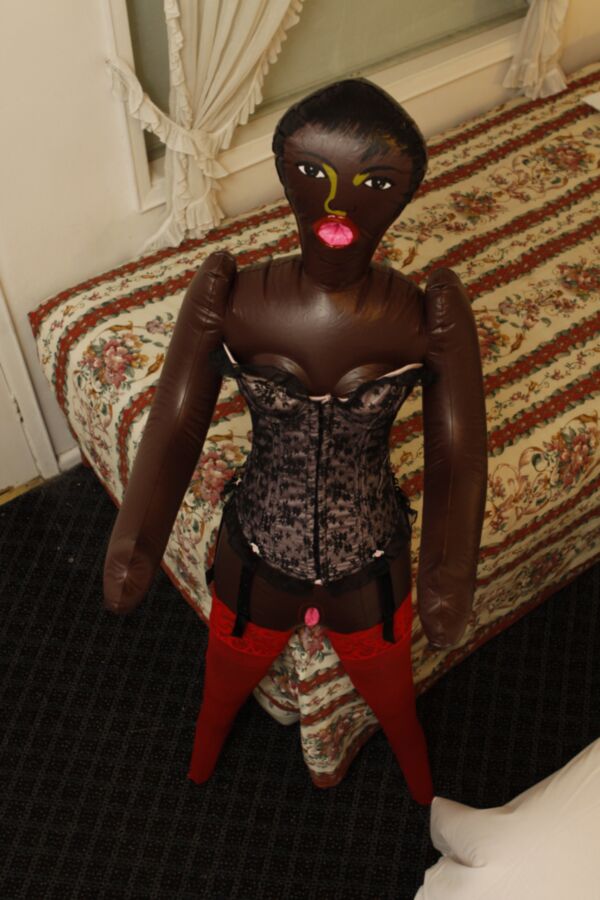 Free porn pics of Black doll wears corset and red pantyhose 19 of 59 pics
