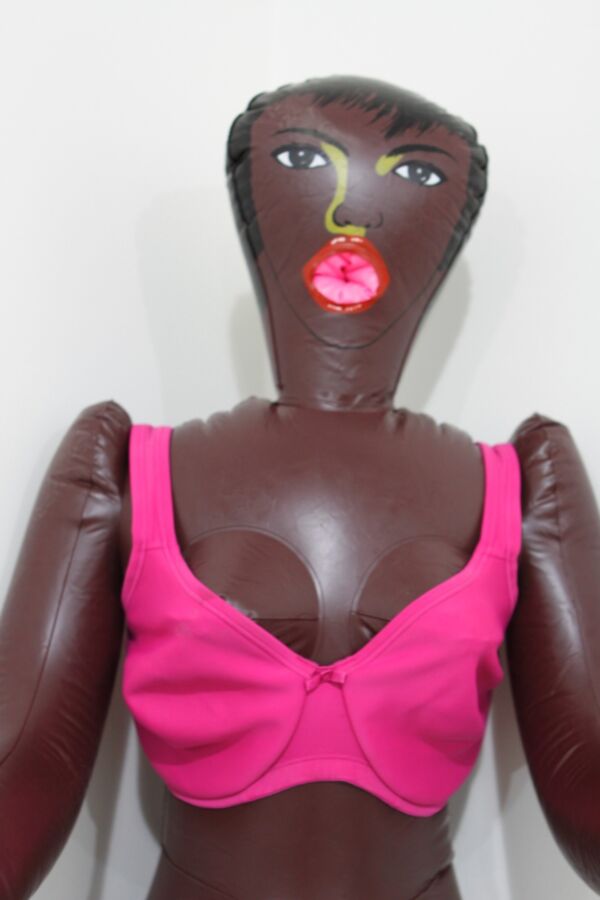 Free porn pics of Black inflatable doll in pink lingerie. 7 of 24 pics