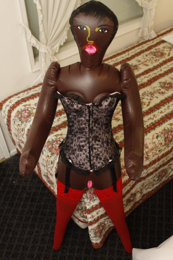 Free porn pics of Black doll wears corset and red pantyhose 20 of 59 pics