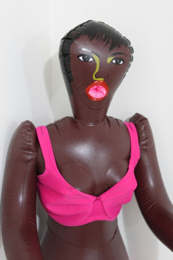 Free porn pics of Black inflatable doll in pink lingerie. 4 of 24 pics