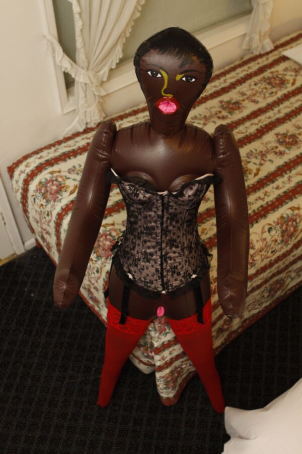 Free porn pics of Black doll wears corset and red pantyhose 18 of 59 pics