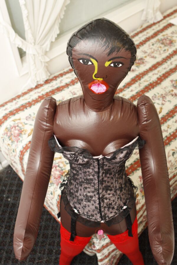 Free porn pics of Black doll wears corset and red pantyhose 16 of 59 pics