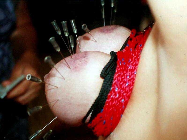 Free porn pics of Nipples and breasts with needles stuck in them 13 of 93 pics
