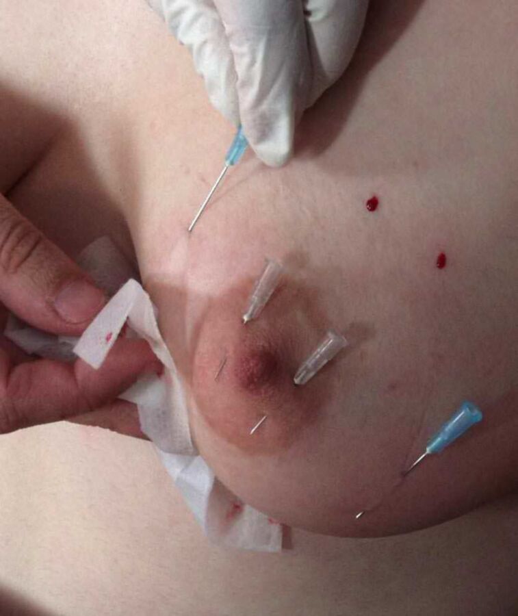 Free porn pics of Nipples and breasts with needles stuck in them 4 of 93 pics