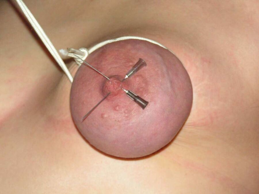 Free porn pics of Nipples and breasts with needles stuck in them 16 of 93 pics
