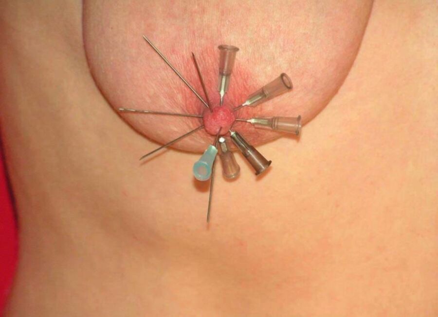 Free porn pics of Nipples and breasts with needles stuck in them 19 of 93 pics