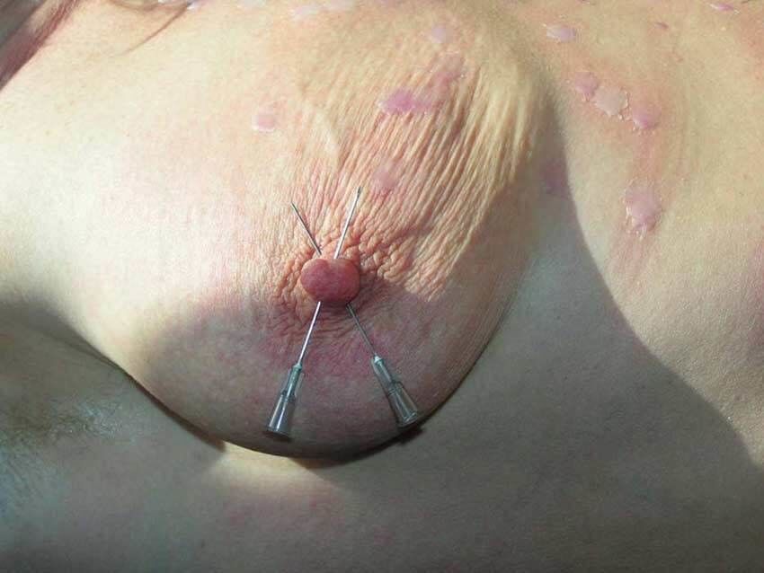Free porn pics of Nipples and breasts with needles stuck in them 17 of 93 pics