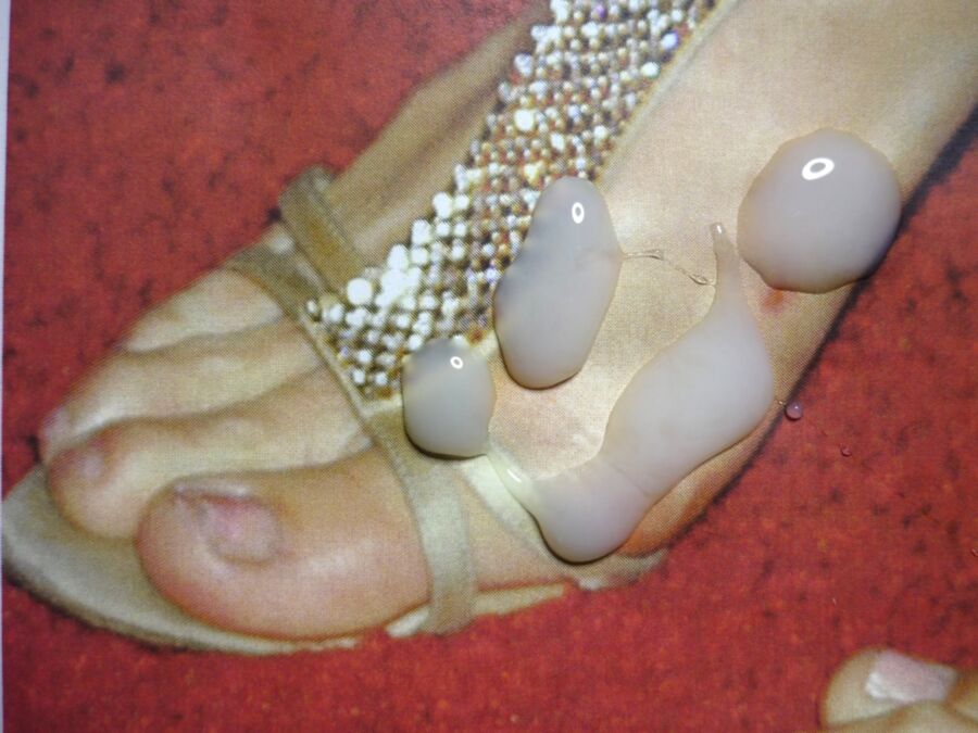 Free porn pics of Paris Hilton says my cum on her feet is gross 12 of 14 pics