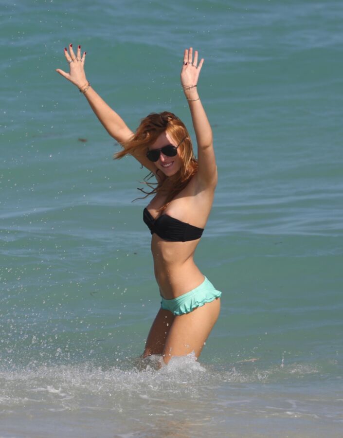 Free porn pics of Bella Thorne Falling Out of Her Tiny Bikini 1 of 43 pics